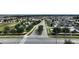 Aerial view of a residential neighborhood with community amenities at 1080 Condor Dr, Haines City, FL 33844