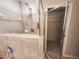 Bathroom with shower and walk-in closet at 1080 Condor Dr, Haines City, FL 33844