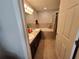 Double vanity bathroom with tub and shower at 1080 Condor Dr, Haines City, FL 33844