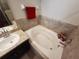 Bathroom with garden tub and separate shower at 1080 Condor Dr, Haines City, FL 33844