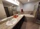 Double vanity bathroom with soaking tub at 1080 Condor Dr, Haines City, FL 33844