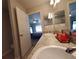 Double vanity bathroom with a view of the bedroom at 1080 Condor Dr, Haines City, FL 33844