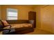 Bedroom with a daybed, window, and a large closet at 1080 Condor Dr, Haines City, FL 33844