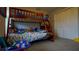 bedroom with bunk beds and ample closet space at 1080 Condor Dr, Haines City, FL 33844
