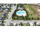 Community pool and recreation area with ample parking at 1080 Condor Dr, Haines City, FL 33844