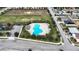 Community pool and recreation area with ample parking at 1080 Condor Dr, Haines City, FL 33844