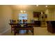 Kitchen dining area with a dark wood table and bench seating at 1080 Condor Dr, Haines City, FL 33844