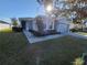 Single story home with gray siding, two car garage and walkway at 1080 Condor Dr, Haines City, FL 33844
