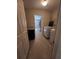Laundry room with washer, dryer, and extra storage at 1080 Condor Dr, Haines City, FL 33844