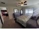 Main bedroom with sliding glass doors to patio at 1080 Condor Dr, Haines City, FL 33844