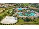 Large community pool complex with beach volleyball at 1539 Flange Dr, Davenport, FL 33896