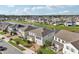 Aerial view of homes along canal shows manicured lawns and mature landscaping at 4949 Olivia Ct, St Cloud, FL 34772