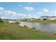 Expansive backyard with waterfront views and private dock at 4949 Olivia Ct, St Cloud, FL 34772