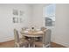 Elegant dining area with stylish table setting and ample natural light at 4949 Olivia Ct, St Cloud, FL 34772