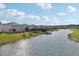 A beautiful waterfront neighborhood features houses with docks to the water way at 4949 Olivia Ct, St Cloud, FL 34772