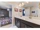 Clean bathroom with double vanity and sleek, modern fixtures at 2933 Fable St, Kissimmee, FL 34746