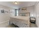 Comfortable bedroom with plush carpeting, stylish decor, and ample natural light at 2933 Fable St, Kissimmee, FL 34746