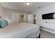 Cozy bedroom with neutral tones, built-in storage, and a serene atmosphere at 2933 Fable St, Kissimmee, FL 34746