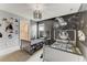 Playful bedroom featuring twin beds, space themed decor and access to a modern bathroom at 2933 Fable St, Kissimmee, FL 34746