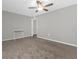 A serene bedroom with neutral tones, carpeted floors, and ample natural light at 3318 Current Ave, Winter Garden, FL 34787