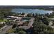 Overhead view of residences, showcasing community pool and nearby lake access at 750 E Michigan St # 163, Orlando, FL 32806