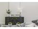 Close up showcasing living room decor including a grey sideboard and decor at 839 Waterfern Trail Dr, Auburndale, FL 33823
