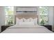 King bed with decorative wall art and matching nightstands at 839 Waterfern Trail Dr, Auburndale, FL 33823