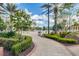 Community pool area with lounge chairs and lush landscaping at 1429 Milledge Ln # 1429, Davenport, FL 33896