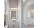Modern bathroom with a floating vanity and contemporary fixtures at 208 Snowy Orchid Way, Lake Alfred, FL 33850