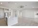 Modern kitchen with white cabinetry, quartz countertops, and island at 208 Snowy Orchid Way, Lake Alfred, FL 33850