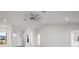 Bright and airy living room with high ceilings and recessed lighting at 208 Snowy Orchid Way, Lake Alfred, FL 33850