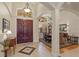 Elegant entryway with double doors & view of dining room at 6130 Blakeford Dr, Windermere, FL 34786