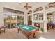 Game room with pool table & view of golf course at 6130 Blakeford Dr, Windermere, FL 34786