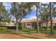 Luxury home with tile roof, screened porch, and golf course views at 6130 Blakeford Dr, Windermere, FL 34786