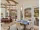 Bright kitchen with breakfast nook overlooking the pool and golf course views at 6130 Blakeford Dr, Windermere, FL 34786