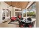 Covered patio with seating area and access to the pool at 6130 Blakeford Dr, Windermere, FL 34786