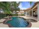 Inviting pool area with spa and outdoor fireplace at 6130 Blakeford Dr, Windermere, FL 34786