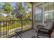 Screened outdoor space showcasing a view of greenery at 637 Pavia Loop, Lake Mary, FL 32746