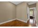 Bright hallway with wood flooring, leading to bedrooms at 637 Pavia Loop, Lake Mary, FL 32746