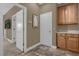 Convenient laundry room with built-in cabinets and storage at 637 Pavia Loop, Lake Mary, FL 32746