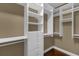 Spacious walk-in closet with ample shelving and hanging space at 637 Pavia Loop, Lake Mary, FL 32746