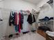 Walk-in closet featuring wire shelving for optimal storage of clothes, shoes, and accessories at 2542 Cliff Way, St Cloud, FL 34771