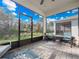 Relaxing screened patio with outdoor seating and serene nature views at 2542 Cliff Way, St Cloud, FL 34771