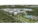 Beautiful aerial view of the water park and resort near a pristine lake at 14501 Grove Resort Ave # 3109, Winter Garden, FL 34787