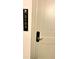 Apartment entrance with modern door and signage next to the door at 14501 Grove Resort Ave # 3109, Winter Garden, FL 34787