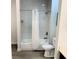 Bright bathroom featuring a tub with shower and white shower curtain at 14501 Grove Resort Ave # 3109, Winter Garden, FL 34787