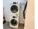 Modern laundry room featuring full size washer and dryer at 14501 Grove Resort Ave # 3109, Winter Garden, FL 34787