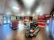 Well-stocked market with red accents, offering various food and beverage selections at 14501 Grove Resort Ave # 3109, Winter Garden, FL 34787
