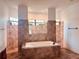 Spa-like bathroom with a large soaking tub at 32702 View Haven Ln, Sorrento, FL 32776