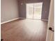 Bright bedroom with sliding glass doors leading to the pool at 32702 View Haven Ln, Sorrento, FL 32776